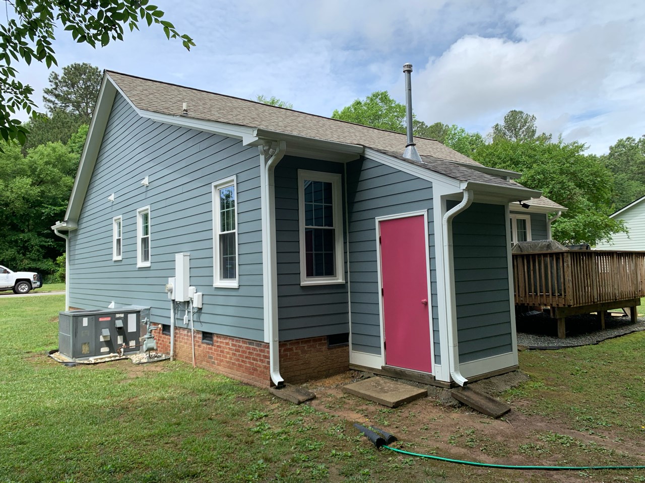 side view of a home before getting new siding