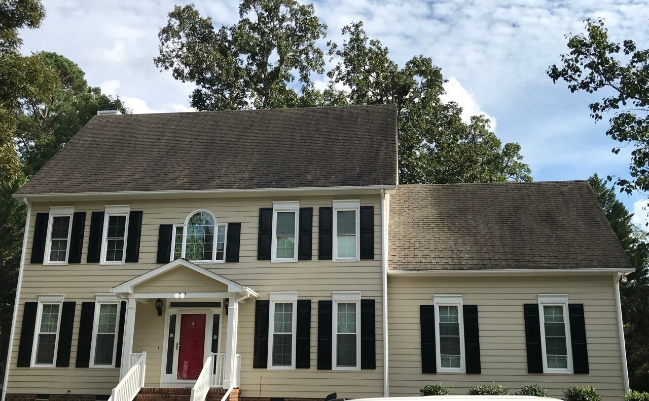Jing Sun's Chapel Hill home before a roof replacement with Owens Corning Shingles