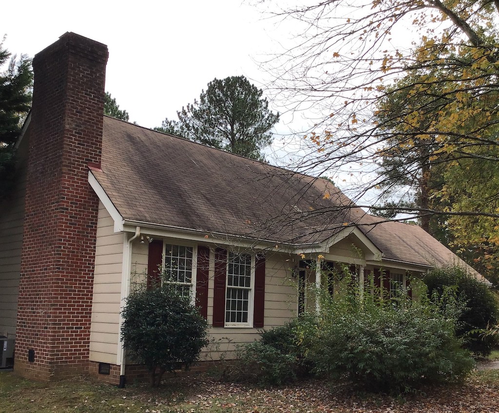 The front of the McNeil home before a CertainTeed Roof Replacement