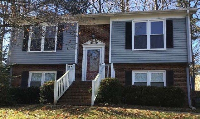 The Sullivan home before getting new James Hardie siding