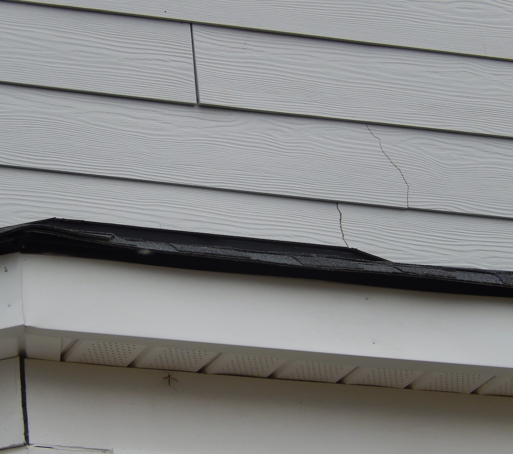 The Sweetow home before a siding and door replacement - 1