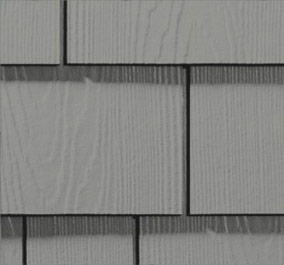 Beige Carolina siding in Raleigh with glass door, white blinds, black lantern, and wicker chair by outlet; tree reflections visible.