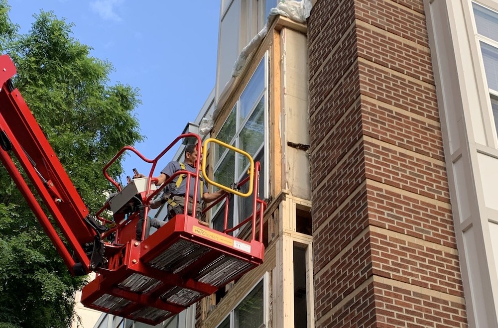 Carolina Exteriors replacing windows on a multi-family home.